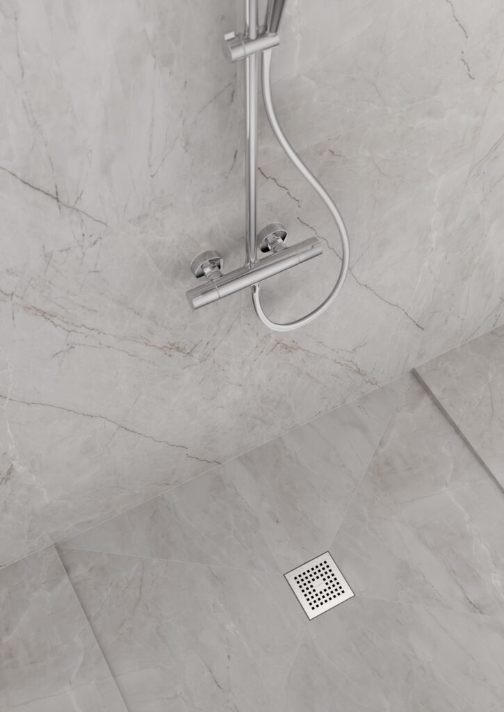 Siphon de douche RainDrain Point de la marque Hansgrohe installé dans une douche