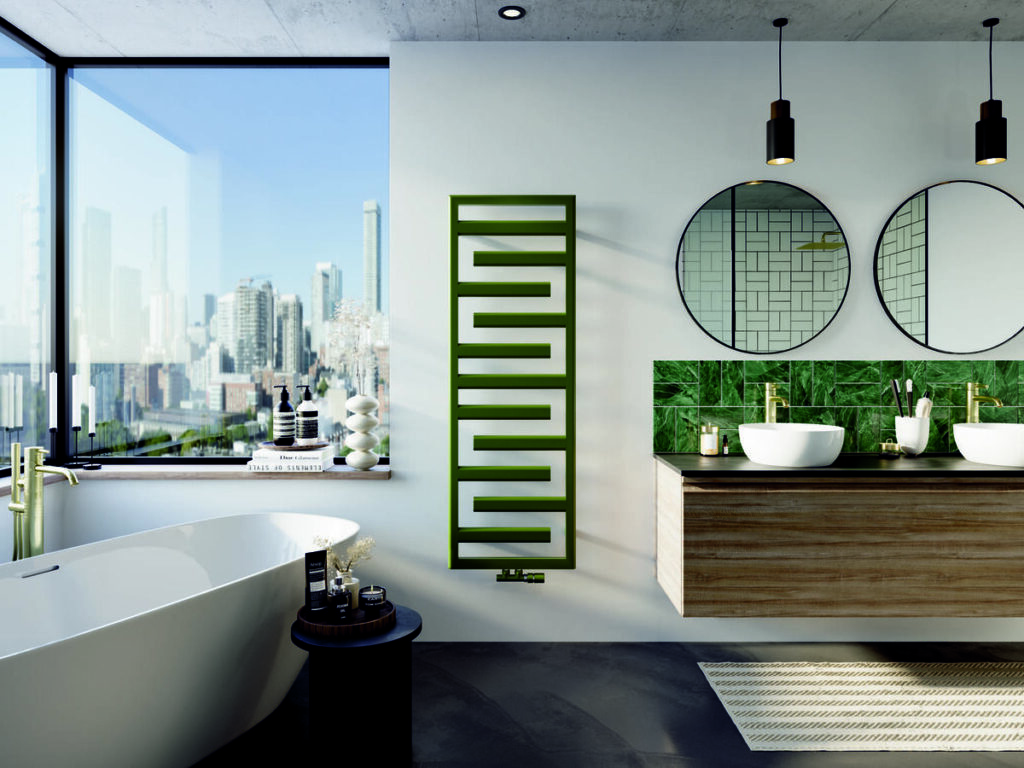 Radiateur sèche-serviettes Acova Kapla en finition vert installé dans une salle de bains